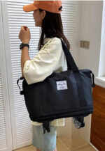 Foldable Expandable Duffel with Detachable Wheels in Black, view 4